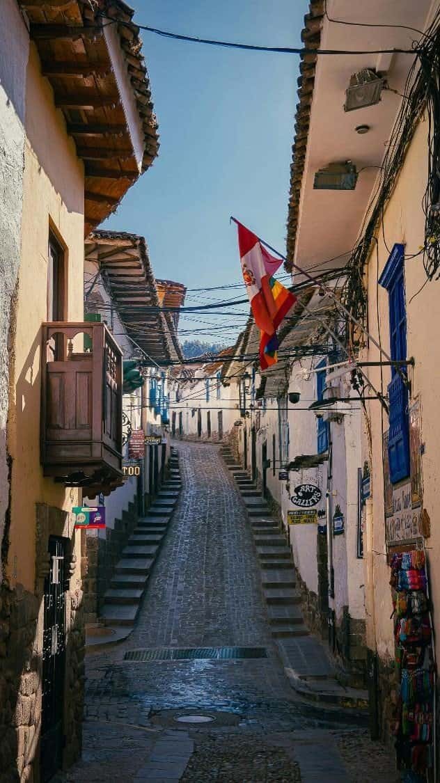 Entrance to the charming San Blas street in Cusco, part of the Cusco City Tour Half Day, offering a glimpse into the city's colonial architecture and artistic neighborhood.