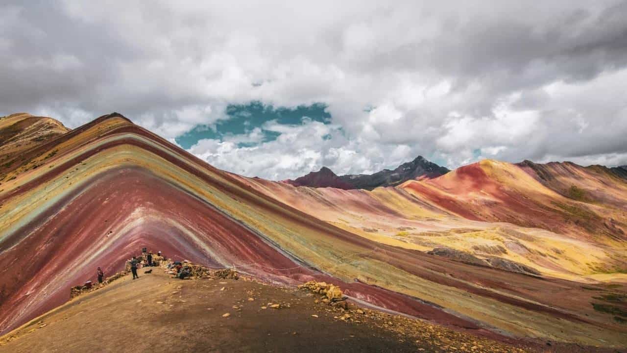 Stunning view of Rainbow Mountain, a highlight of Peru travel and vacation experiences.